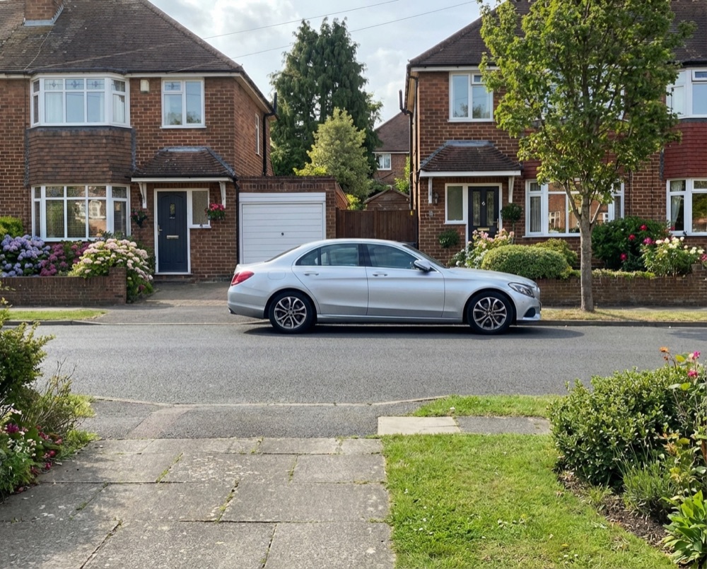 Residential street in Bognor Regis with wheelie bins